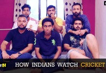 Cricket crazy Indians cross all limits as they watch a cricket game on TV.