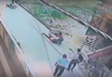 CCTV footage of a man stabbing a woman over 22 times on a busy road in Delhi.