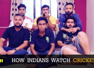 Cricket crazy Indians cross all limits as they watch a cricket game on TV.