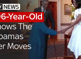 106-year-old Virginia McLaurin walks into the White House, yells 'Hi!' to President Obama, opening her arms wide with excitement as he comes over and takes her hands.